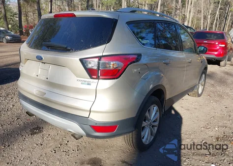 2017 Ford Escape Titanium from USA, damaged, VIN 1FMCU9J96HUB91281